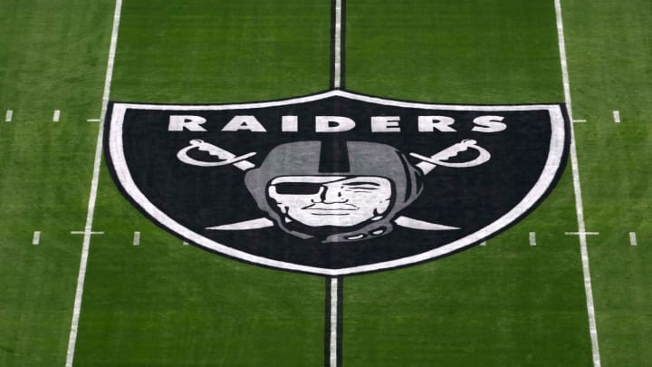 Nov 14, 2021; Paradise, Nevada, USA; A detailed view of the Las Vegas Raiders shield logo at midfield at Allegiant Stadium. Mandatory Credit: Kirby Lee-USA TODAY Sports