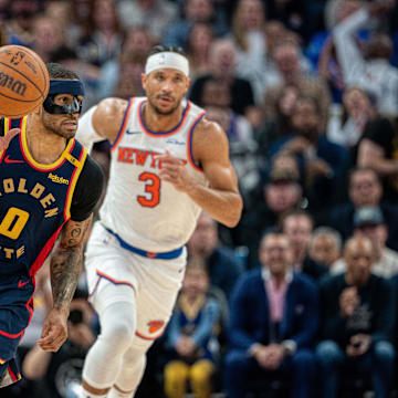 Mar 15, 2025; San Francisco, California, USA; Golden State Warriors guard Gary Payton II (0) starts a fast break against New York Knicks guard Josh Hart (3) during the fourth quarter at Chase Center. Mandatory Credit: Neville E. Guard-Imagn Images