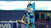 The Marlins brought out the brooms—literally—after Sunday's victory earn the club a sweep of the Yankees. 