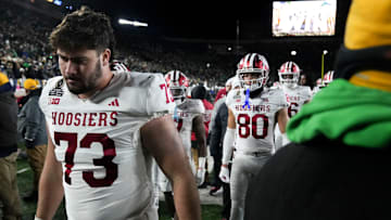 Indiana Hoosiers offensive lineman Austin Barrett (73) leaves the field along with other players after losing a game between the Indiana Hoosiers and the Notre Dame Fighting Irish in first round of the College Football Playoff on Saturday, Dec. 21, 2024, in South Bend. Notre Dame defeated Indiana 27-17.