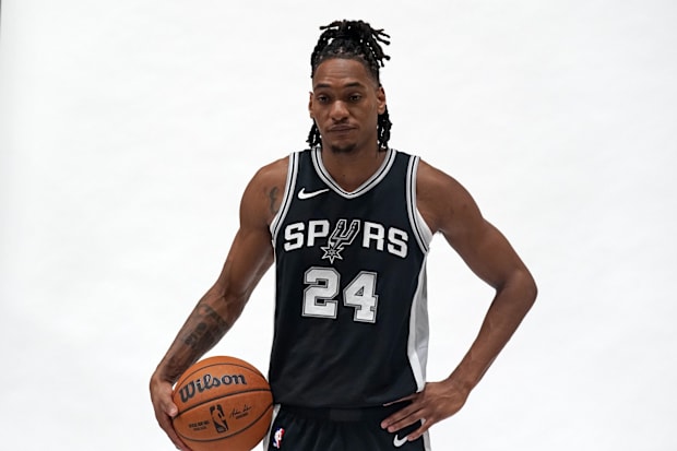 San Antonio Spurs guard Devin Vassell (24) poses for photos during Media day at Victory Capital Performance Center.