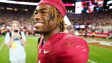 Sep 28, 2024; Tuscaloosa, Alabama, USA;  Alabama Crimson Tide quarterback Jalen Milroe (4) celebrates after defeating the Georgia Bulldogs at Bryant-Denny Stadium. Mandatory Credit: John David Mercer-Imagn Images