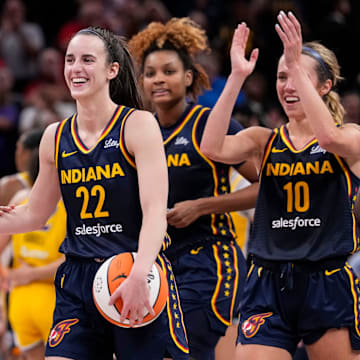 Indiana Fever forward Aliyah Boston (7) celebrates with Indiana Fever guard Caitlin Clark (22) altering recording a triple-double Wednesday, Sept. 4, 2024, during the game at Gainbridge Fieldhouse in Indianapolis. The Indiana Fever defeated the Los Angeles Sparks, 93-86.