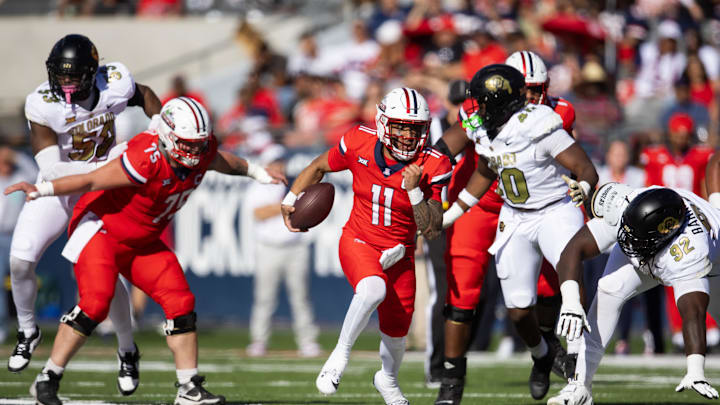 Oct 19, 2024; Tucson, Arizona, USA; Arizona Wildcats quarterback Noah Fifita (11) against the Colorado Buffalos at Arizona Stadium. Mandatory Credit: Mark J. Rebilas-Imagn Images