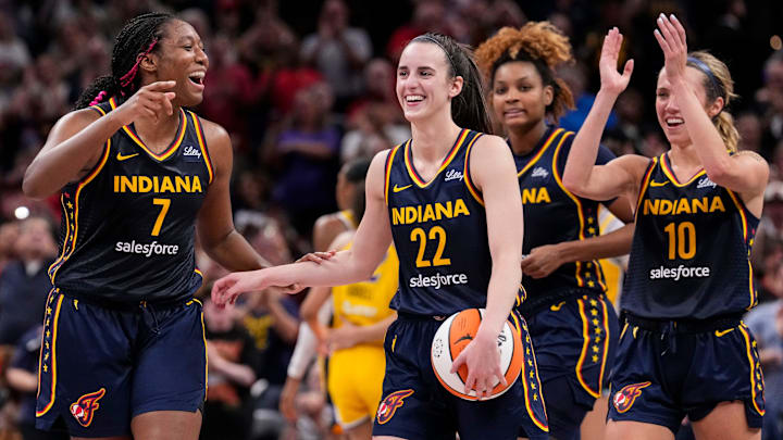 Indiana Fever forward Aliyah Boston (7) celebrates with Indiana Fever guard Caitlin Clark (22) altering recording a triple-double Wednesday, Sept. 4, 2024, during the game at Gainbridge Fieldhouse in Indianapolis. The Indiana Fever defeated the Los Angeles Sparks, 93-86.