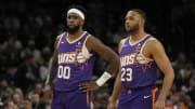 Feb 13, 2024; Phoenix, Arizona, USA; Phoenix Suns forward Royce O'Neale (00) and guard Eric Gordon