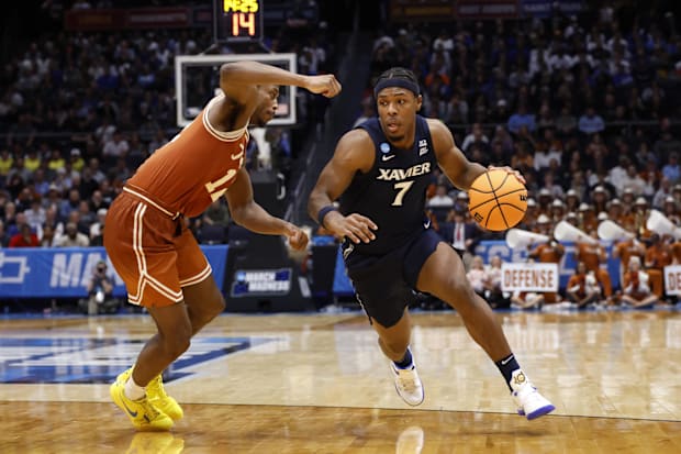 Xavier guard Ryan Conwell dribbles the ball against Texas.