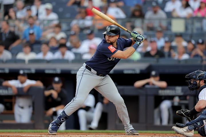 Seattle Mariners catcher Cal Raleigh bats against the New York Yankees during the first inning at Yankee Stadium. 