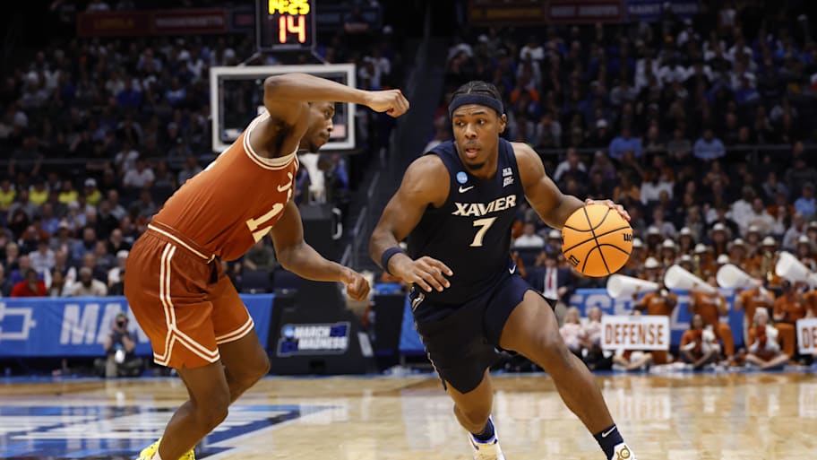 Xavier guard Ryan Conwell dribbles the ball against Texas.