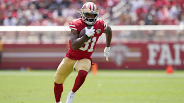Aug 29, 2021; Santa Clara, California, USA; San Francisco 49ers running back Raheem Mostert (31) runs the ball against the Las Vegas Raiders in the first quarter at Levi's Stadium. Mandatory Credit: Cary Edmondson-Imagn Images