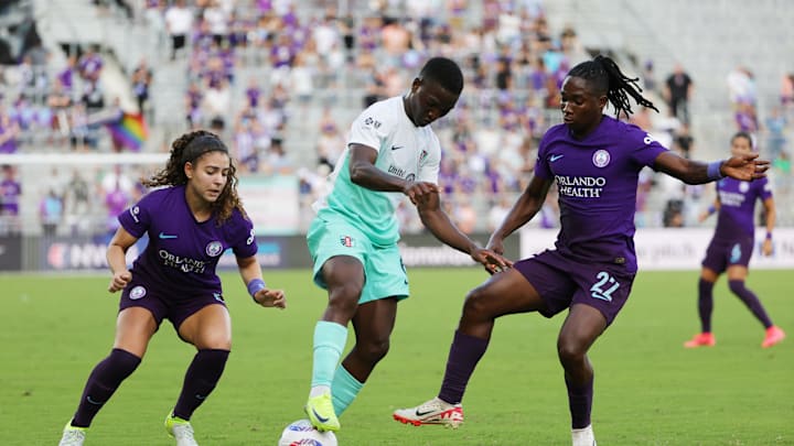  Kansas City Current forward Temwa Chawinga (6) is defended by Orlando Pride midfielder Angelina (15) and Orlando Pride forward Barbra Banda (22) in a NWSL playoff semifinal match at Inter&Co Stadium 