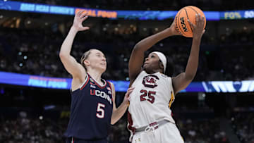 Apr 6, 2025; Tampa, FL, USA; Connecticut Huskies guard Paige Bueckers (5) defends against South Carolina Gamecocks guard Raven Johnson (25) during the first half of the national championship of the women's 2025 NCAA tournament at Amalie Arena. Mandatory Credit: Kirby Lee-Imagn Images