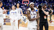 Mar 22, 2025; Baton Rouge, Louisiana, USA;  LSU Lady Tigers guard Flau'Jae Johnson (4) celebrates after the game against the San Diego State Aztecs at Pete Maravich Assembly Center. Mandatory Credit: Stephen Lew-Imagn Images