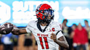 Sep 11, 2025; Winston-Salem, North Carolina, USA; North Carolina State Wolfpack quarterback CJ Bailey (11) throws a pass in first half against Wake Forest Demon Deacons at Allegacy Federal Credit Union Stadium. Mandatory Credit: Luke Jamroz-Imagn Images