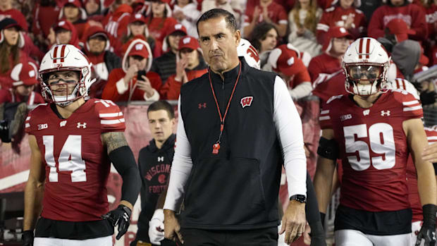 Nov 16, 2024; Madison, Wisconsin, USA;  Wisconsin Badgers head coach Luke Fickell during warmups prior to the game against th