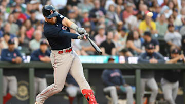 Aug 1, 2023; Seattle, Washington, USA; Boston Red Sox second baseman Christian Arroyo (39) hits a two run RBI double against the Seattle Mariners during the fourth inning at T-Mobile Park. Mandatory Credit: Steven Bisig-Imagn Images