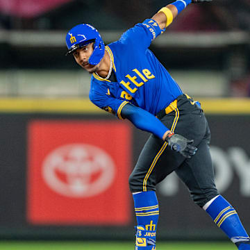 Seattle Mariners center fielder Julio Rodriguez celebrates after hitting a double during a game against the Texas Rangers on Friday at T-Mobile Park.