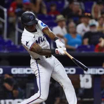 Miami Marlins shortstop Tim Anderson (7) hits a single against the St. Louis Cardinals during the sixth inning at loanDepot Park on June 19.