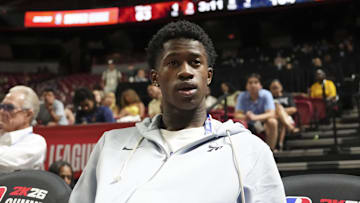 Jul 10, 2025; Las Vegas, NV, USA; Philadelphia 76ers guard VJ Edgecombe (77) watches the game against the San Antonio Spurs from the baseline at Thomas & Mack Center. Mandatory Credit: Candice Ward-Imagn Images