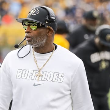 Nov 8, 2025; Morgantown, West Virginia, USA; Colorado Buffaloes head coach Deion Sanders walks along the sidelines late in the fourth quarter against the West Virginia Mountaineers at Milan Puskar Stadium. Mandatory Credit: Ben Queen-Imagn Images