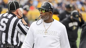Nov 8, 2025; Morgantown, West Virginia, USA; Colorado Buffaloes head coach Deion Sanders walks along the sidelines late in the fourth quarter against the West Virginia Mountaineers at Milan Puskar Stadium. Mandatory Credit: Ben Queen-Imagn Images