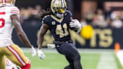Sep 14, 2025; New Orleans, Louisiana, USA;  New Orleans Saints running back Alvin Kamara (41) runs against the San Francisco 49ers during the first half at Caesars Superdome. Mandatory Credit: Stephen Lew-Imagn Images