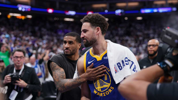 Apr 16, 2024; Sacramento, California, USA; Golden State Warriors guard Klay Thompson (11) and guard Gary Payton II (0) walk towards the locker room after the Warriors lost to the Sacramento Kings during a play-in game of the 2024 NBA playoffs at the Golden 1 Center. Mandatory Credit: Cary Edmondson-USA TODAY Sports