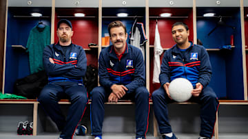 Brendan Hunt, Jason Sudeikis and Nick Mohammed in “Ted Lasso” season two, now streaming on Apple TV+.