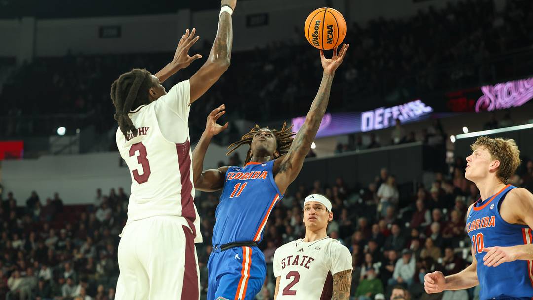 Feb 11, 2025; Starkville, Mississippi, USA; Florida Gators guard Denzel Aberdeen (11) shoots against Mississippi State Bulldogs forward KeShawn Murphy (3) during the first half at Humphrey Coliseum. Mandatory Credit: Wesley Hale-Imagn Images Feb 11, 2025; Starkville, Mississippi, USA; Florida Gators guard Denzel Aberdeen (11) shoots against Mississippi State Bulldogs forward KeShawn Murphy (3) during the first half at Humphrey Coliseum. Mandatory Credit: Wesley Hale-Imagn Images