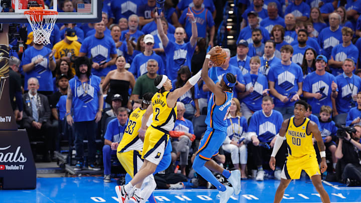 Jun 22, 2025; Oklahoma City, Oklahoma, USA; Oklahoma City Thunder guard Shai Gilgeous-Alexander (2) shoots the ball as Indiana Pacers guard Andrew Nembhard (2) defends during the second half in Game 7 of the 2025 NBA Finals at Paycom Center. Mandatory Credit: Alonzo Adams-Imagn Images Jun 22, 2025; Oklahoma City, Oklahoma, USA; Oklahoma City Thunder guard Shai Gilgeous-Alexander (2) shoots the ball as Indiana Pacers guard Andrew Nembhard (2) defends during the second half in Game 7 of the 2025 NBA Finals at Paycom Center. Mandatory Credit: Alonzo Adams-Imagn Images