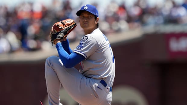 Los Angeles Dodgers starting pitcher Shohei Ohtani (17) throws a pitch against the San Francisco Giants.