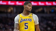 Dec 13, 2024; Minneapolis, Minnesota, USA; Los Angeles Lakers forward Cam Reddish (5) enters the court after a timeout in the second quarter against the Minnesota Timberwolves at Target Center. Mandatory Credit: Matt Blewett-Imagn Images