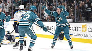 Oct 10, 2024; San Jose, California, USA; San Jose Sharks center Macklin Celebrini (71) reacts after center Tyler Toffoli (73) scores a goal during the first period against the St. Louis Blues at SAP Center at San Jose. Mandatory Credit: Stan Szeto-Imagn Images