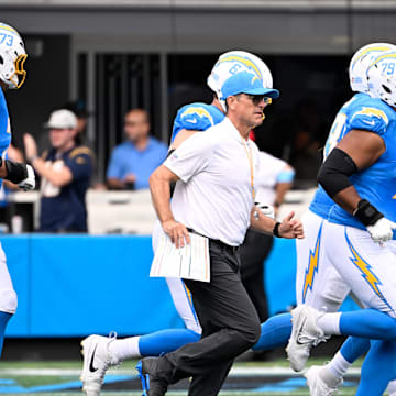 Sep 15, 2024; Charlotte, North Carolina, USA; Los Angeles Chargers head coach Jim Harbaugh  before the game at Bank of America Stadium. Mandatory Credit: Bob Donnan-Imagn Images