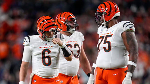 Cincinnati Bengals quarterback Jake Browning (6) gets back to his feet after being sacked. 