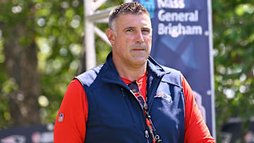 Jul 28, 2025; Foxborough, MA, USA; New England Patriots head coach Mike Vrabel heads to the practice fields for training camp at Gillette Stadium. Mandatory Credit: Eric Canha-Imagn Images