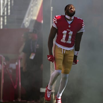 Sep 9, 2024; Santa Clara, California, USA; San Francisco 49ers wide receiver Brandon Aiyuk (11) is introduced to the crowd before the game against the New York Jets at Levi's Stadium. Mandatory Credit: Darren Yamashita-Imagn Images