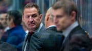 Jan 18, 2025; Vancouver, British Columbia, CAN; Vancouver Canucks assistant coach Adam Foote on the bench against the Edmonton Oilers in the second period at Rogers Arena. Mandatory Credit: Bob Frid-Imagn Images