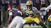 Green Bay Packers cornerback Jaire Alexander (23) tackles Chicago Bears running back D'Andre Swift on Nov. 17.