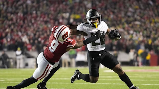 Nov 16, 2024; Madison, Wisconsin, USA;  Oregon Ducks running back Jordan James (20) during the game against the Wisconsin Bad