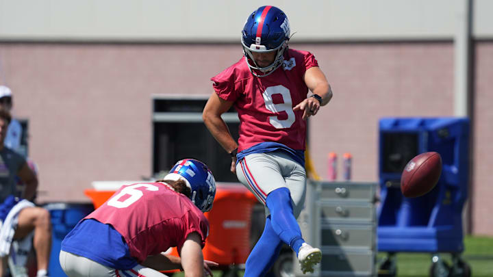 Jul 26, 2024; East Rutherford, NJ, USA; New York Giants kicker Graham Gano (9) attempts a field goal during training camp at Quest Diagnostics Training Center.  