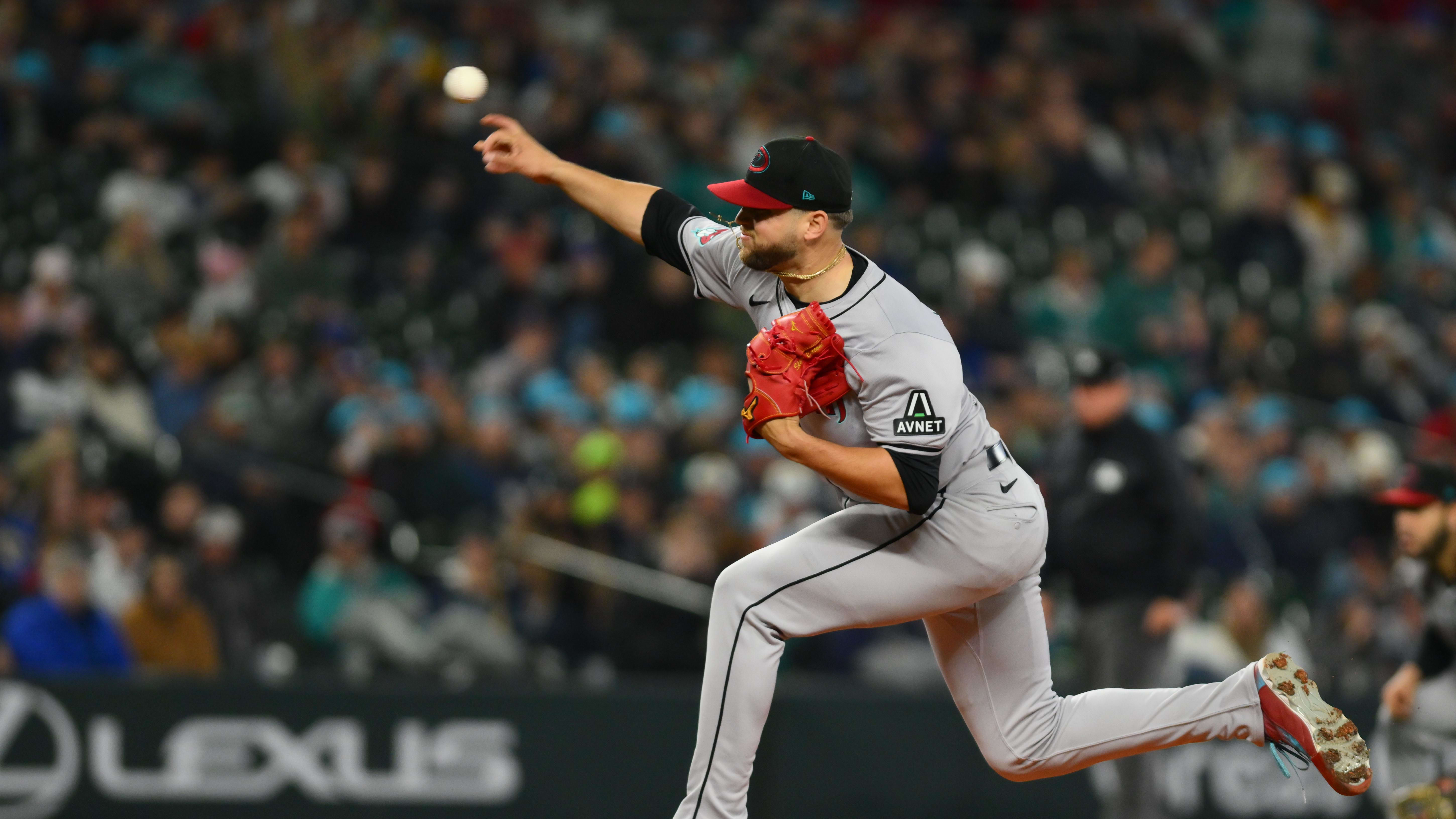 Arizona Diamondbacks starting pitcher Slade Cecconi pitches against the Seattle Mariners at T-Mobile Park.
