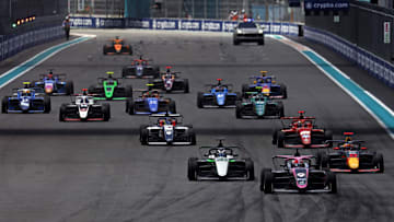 May 4, 2024; Miami Gardens, Florida, USA; F1 Academy driver Abbi Pulling (9) leads the start of the F1 Academy First Race at Miami International Autodrome. Mandatory Credit: Peter Casey-Imagn Images
