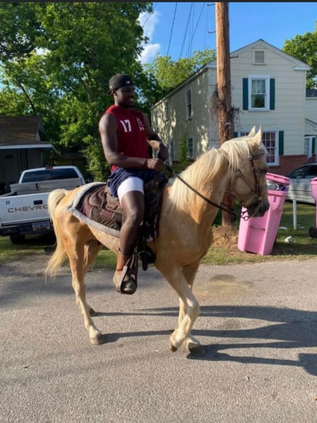 Xavier Legette riding a horse