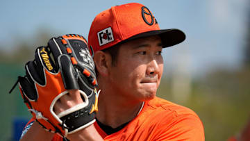 Orioles right-hand pitcher Tomoyuki Sugano throws a pitch during his session in the bullpen on Monday. The Baltimore Orioles held their first full-squad workout of the 2025 spring training season on Monday, Feb. 18th in Sarasota, Florida.