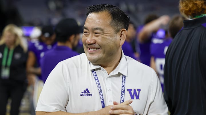 Aug 31, 2024; Seattle, Washington, USA; Washington Huskies athletic director Pat Chun stands on the sideline during the fourth quarter against the Weber State Wildcats at Alaska Airlines Field at Husky Stadium. Mandatory Credit: Joe Nicholson-Imagn Images