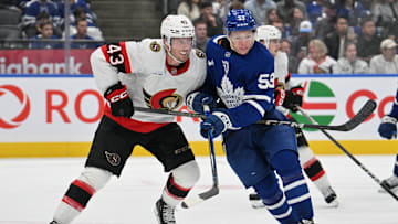 Sep 22, 2024; Toronto, Ontario, CAN;  Ottawa Senators defenseman Tyler Kleven (43) covers Toronto Maple Leafs forward Easton Cowan (53) in the third period at Scotiabank Arena. Mandatory Credit: Dan Hamilton-Imagn Images