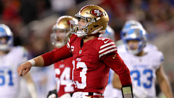 Dec 30, 2024; Santa Clara, California, USA; San Francisco 49ers quarterback Brock Purdy (13) celebrates after scoring a touchdown during the second quarter against the Detroit Lions at Levi's Stadium. Mandatory Credit: Sergio Estrada-Imagn Images