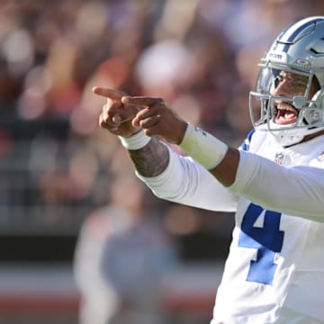 Sep 8, 2024; Cleveland, Ohio, USA; Dallas Cowboys quarterback Dak Prescott (4) celebrates after a touchdown during the first half against the Cleveland Browns at Huntington Bank Field. Mandatory Credit: Ken Blaze-Imagn Images