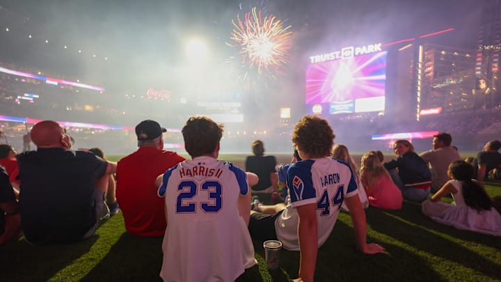 Jul 4, 2025; Atlanta, Georgia, USA; Atlanta Braves fans watch the fireworks display after a game against the Baltimore Orioles at Truist Park. Mandatory Credit: Brett Davis-Imagn Images
